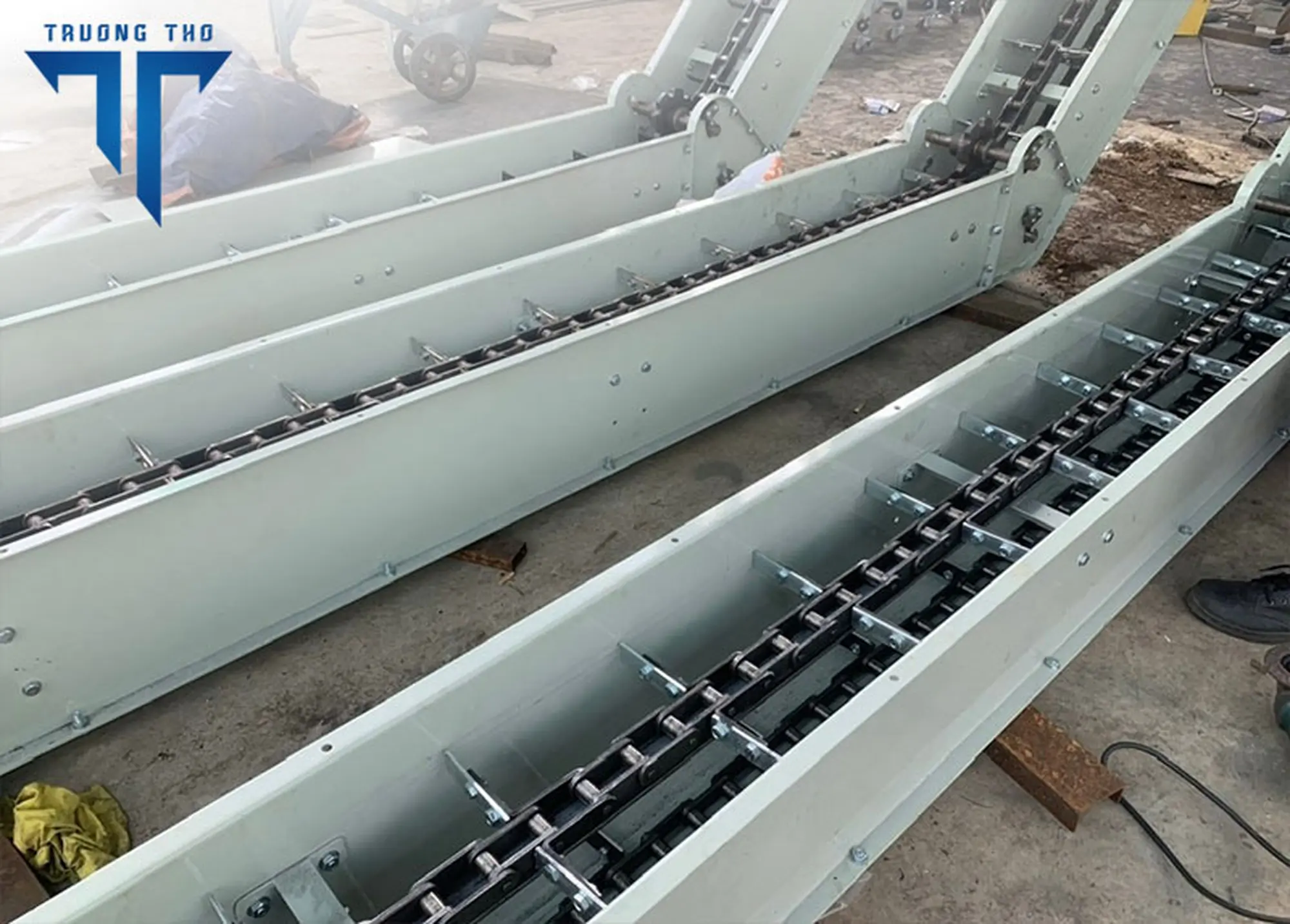 Hệ thống băng tải xích cào