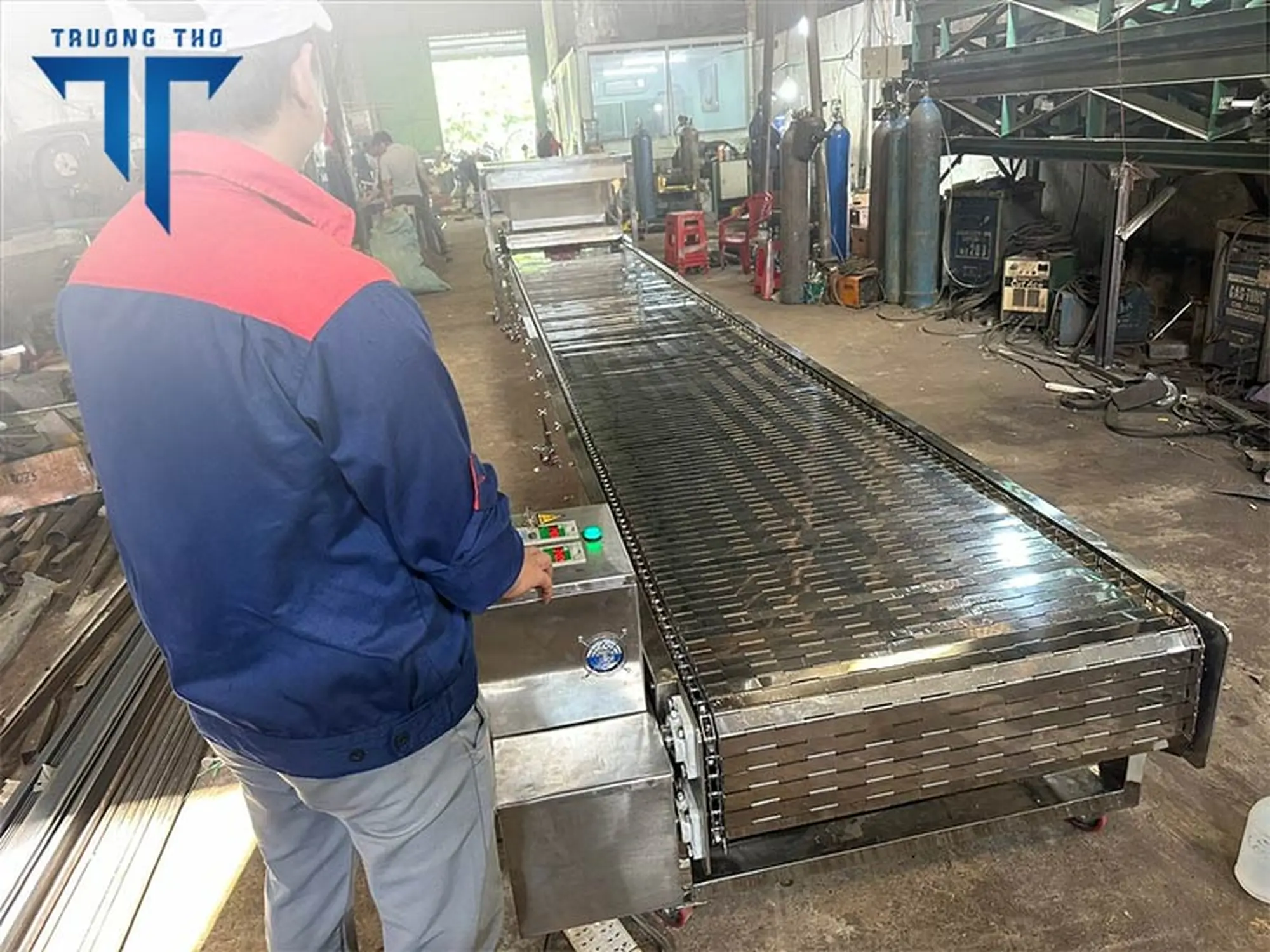 Băng tải xích tấm inox