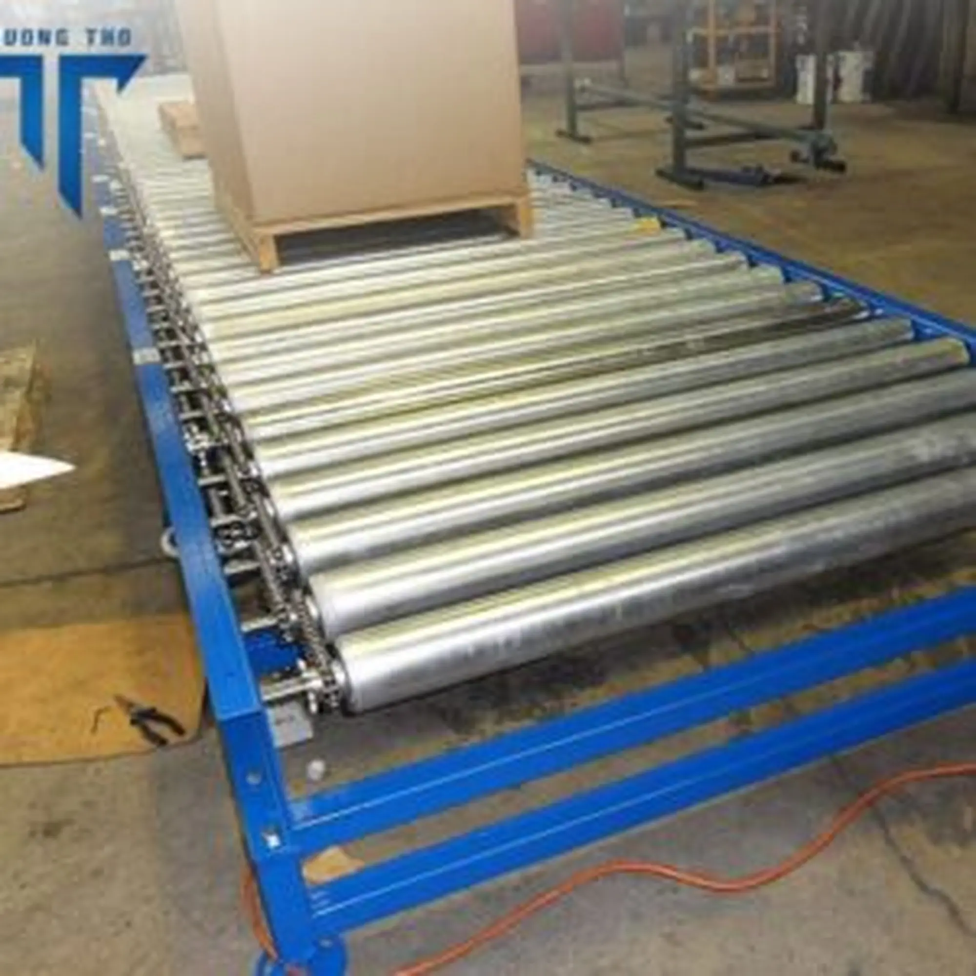 Băng Tải Con Lăn Xích