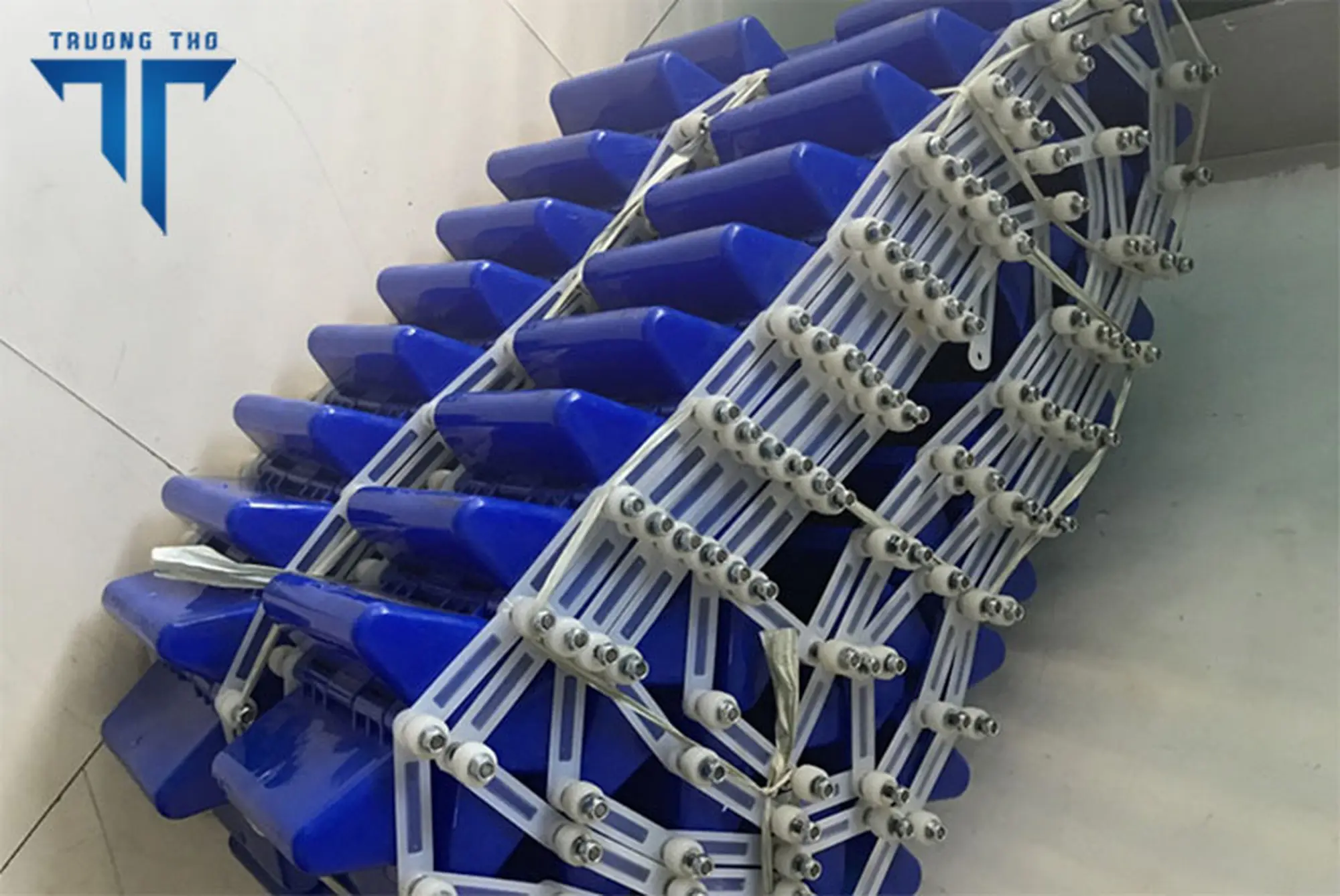 Gầu nhựa băng tải