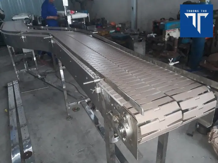 nguyên lí hoạt động của băng tải xích bản lề